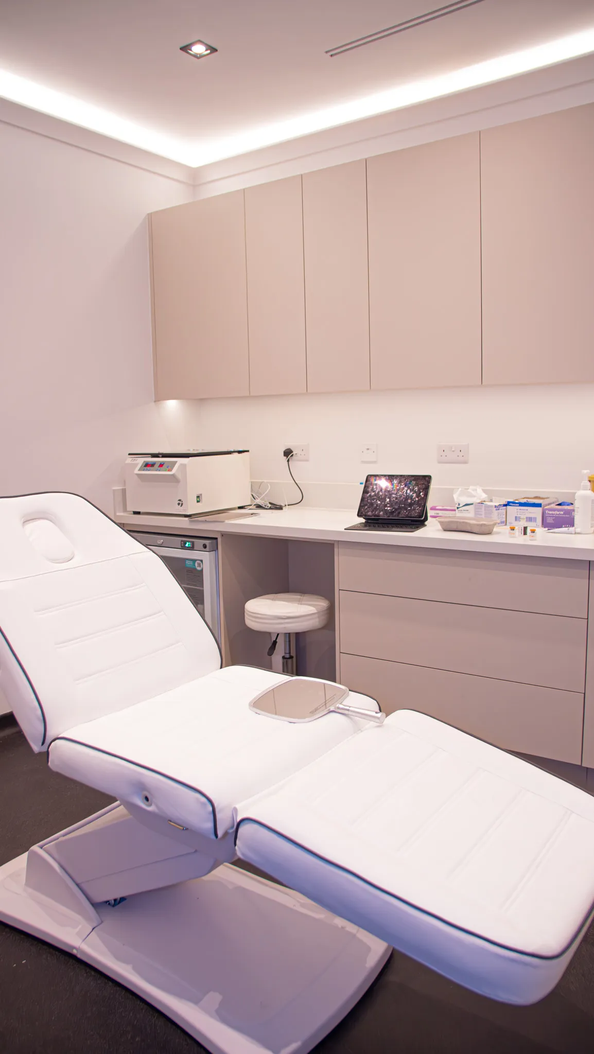 A cheek filler consultation in progress at Wellface Cobham